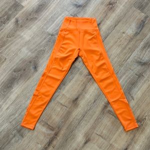 Orange Buff Bunny leggings